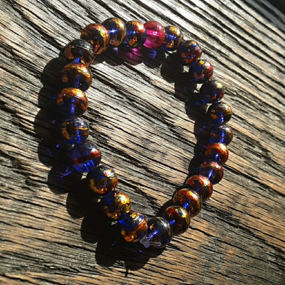 Colorful gold crackled handmade beaded bracelet.